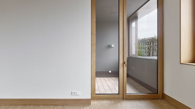 Narrow-stile door at the Catholic Provost Church of St. Trinitatis in Leipzig featuring FSB bronze hardware.