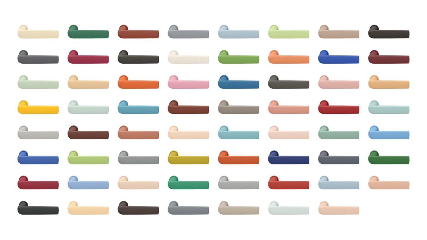 FSB 1267 door handles in 63 Les Couleurs® Le Corbusier® shades, arranged in a precise grid on a neutral background