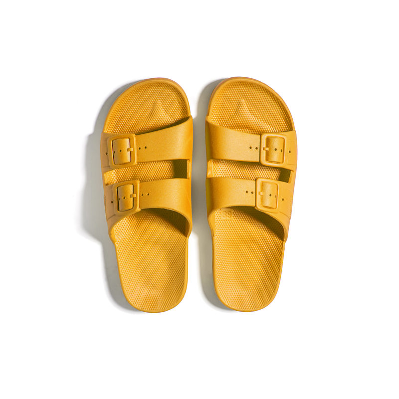 Yellow slides shoes top