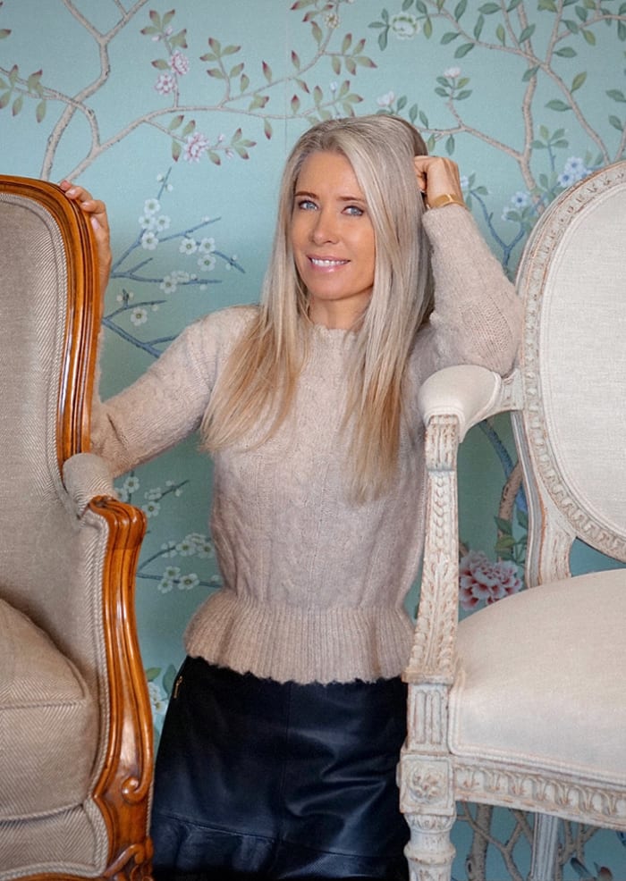 Chrystelle Baran with antique chairs