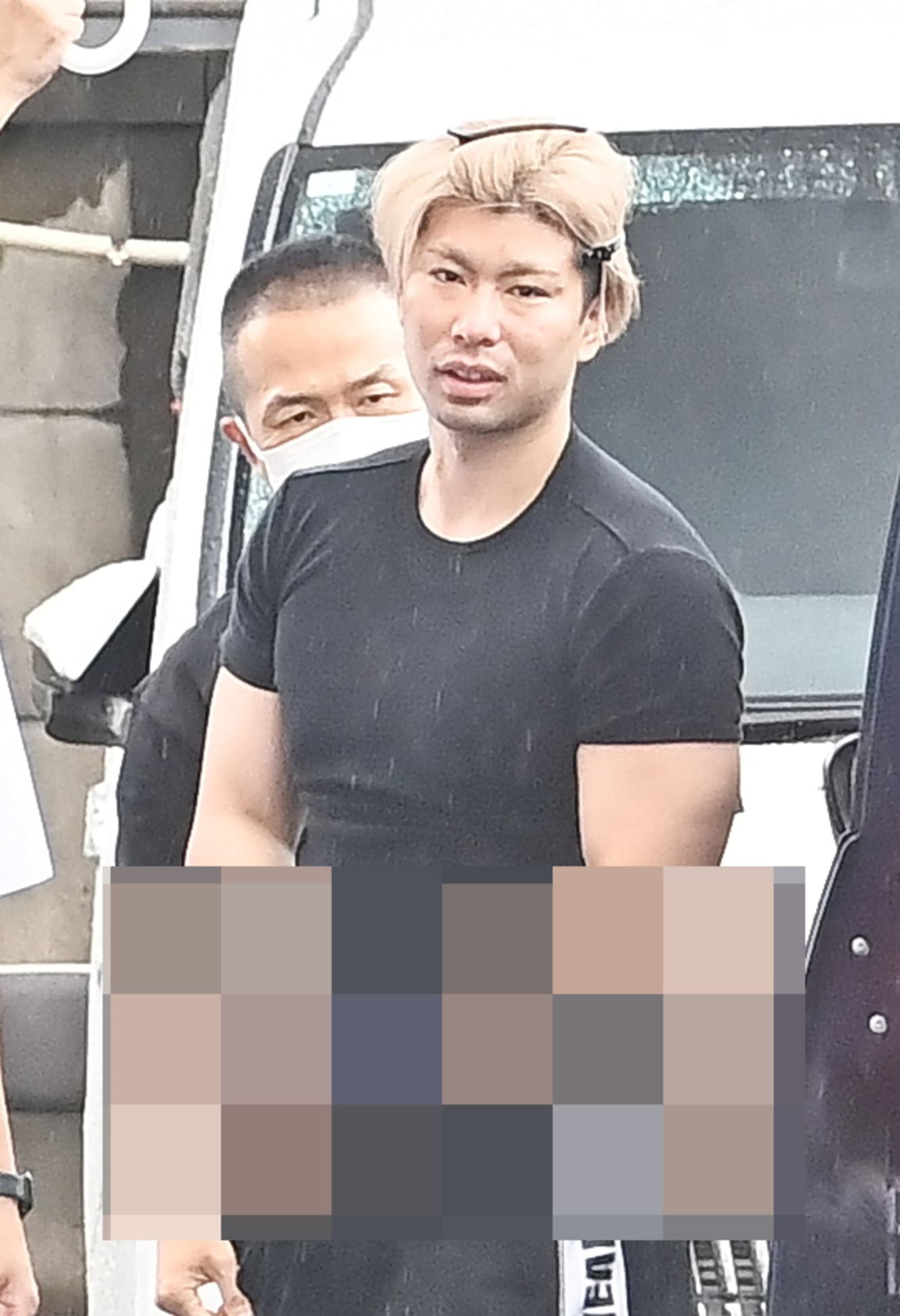 黙秘している斎藤容疑者（写真は一部加工しています）