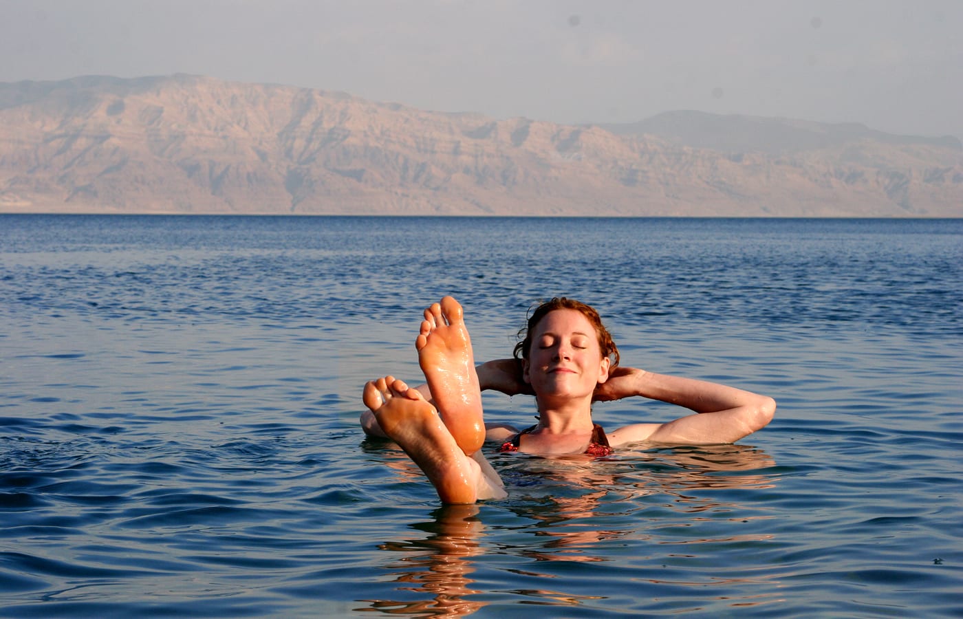 Woman relaxing in the Dead Sea