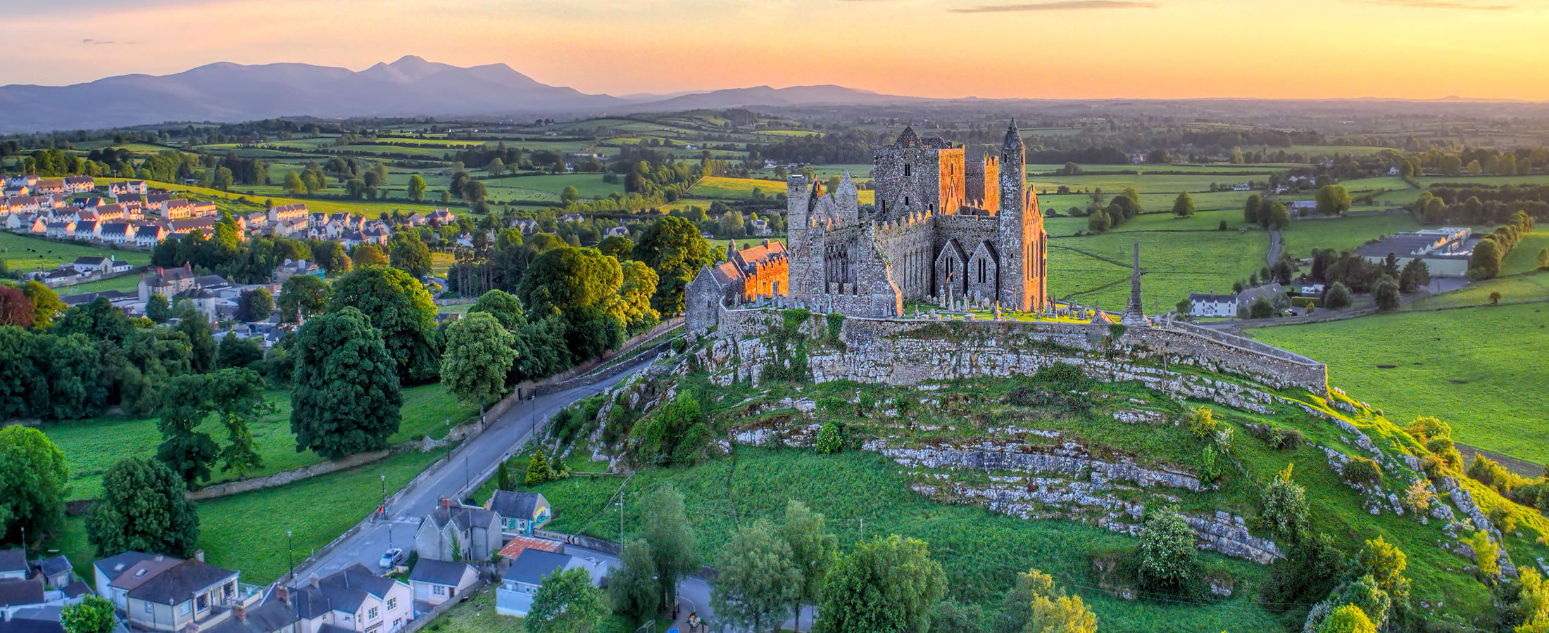 Aerial view of Rock of Cashel at sunset