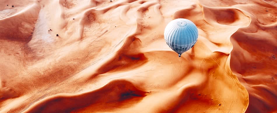 Hot air balloon over desert, Dubai