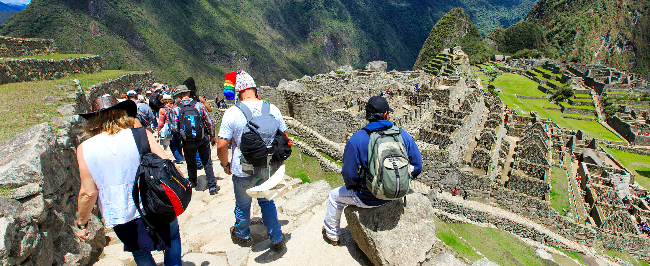 Tourists exploring Machu Picchu
