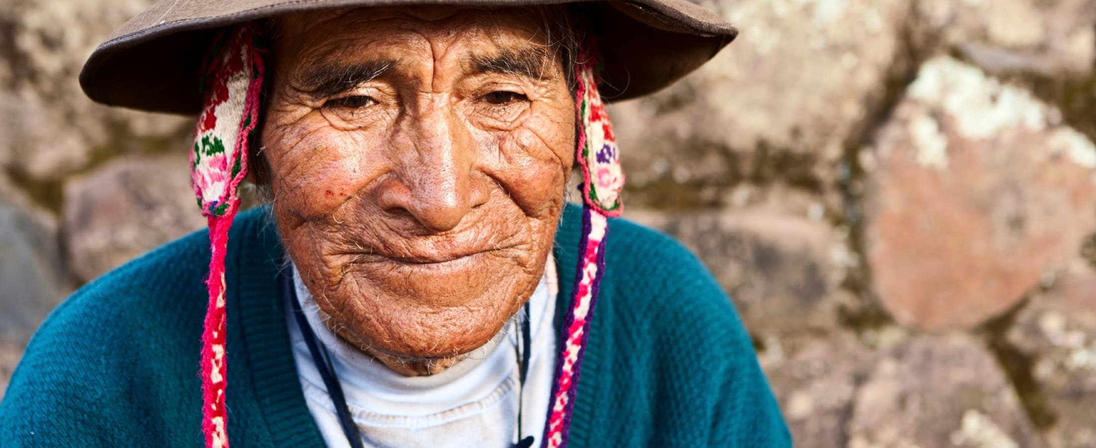 Man selling coca leaves, Pisac ruins