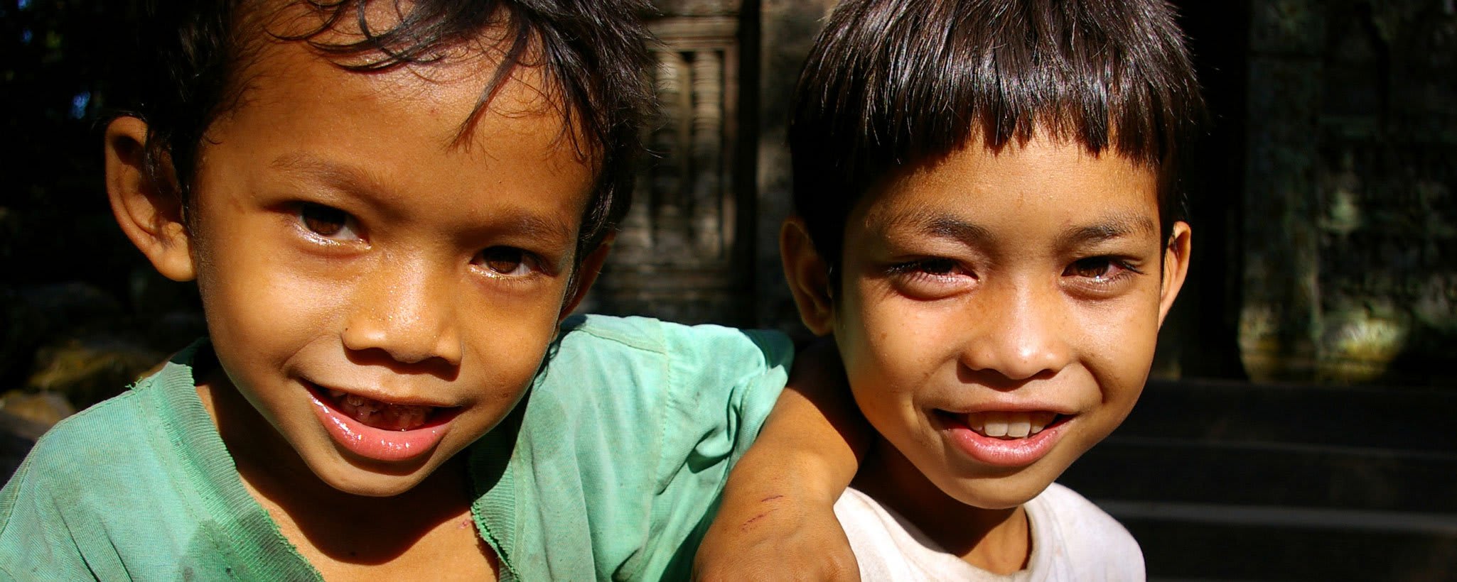Boys selling postcards at Angkor