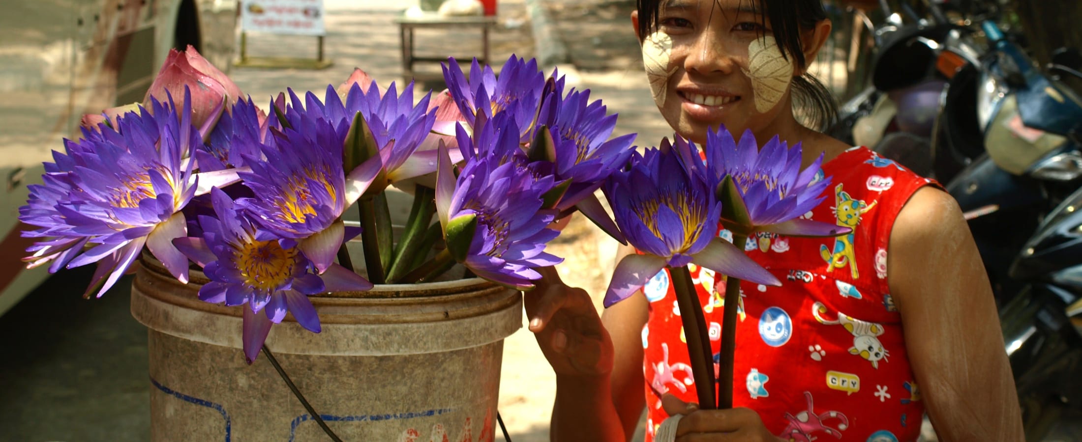 Girl selling lotus blossoms