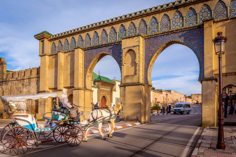 A tourist coach crossing Bab Moulay Ismail, Meknes