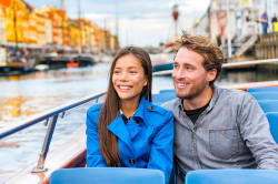 Couple cruising the canals of Copenhagen 