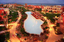 Aerial view of village and pool