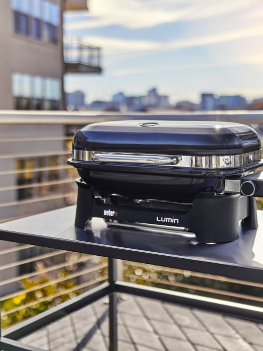Barbacoa Weber® Eléctrica Lumin 1.000 Compact negra