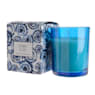 Vela perfumada en vaso azul