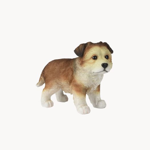 Figura de jardín perro levantado