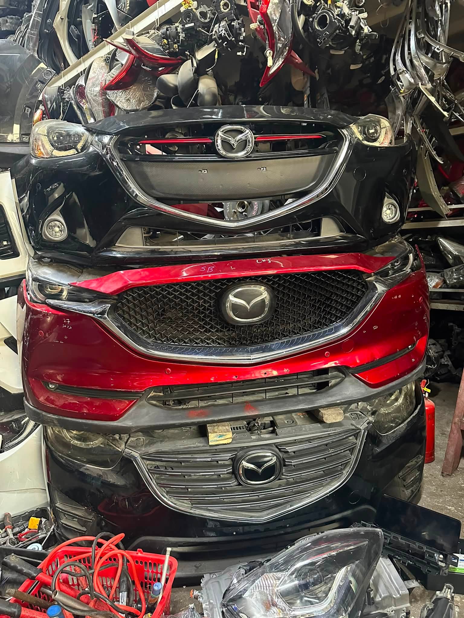 Mazda front-end assemblies nose cuts
