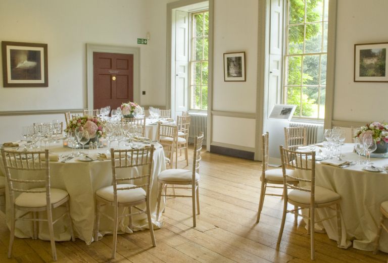 Bishop terricks dining room set up with beautiful table settings for a private event