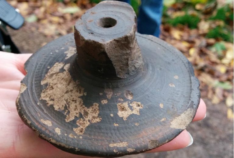 a roman nene valley pot lid