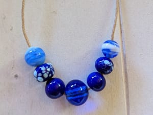 Atelier création de bijou en verre filé à Daux (31)