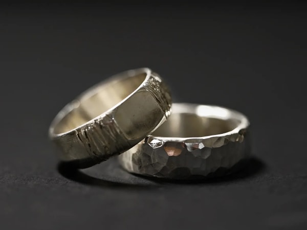 Atelier duo of silver rings with fine stones in Paris 8th distri