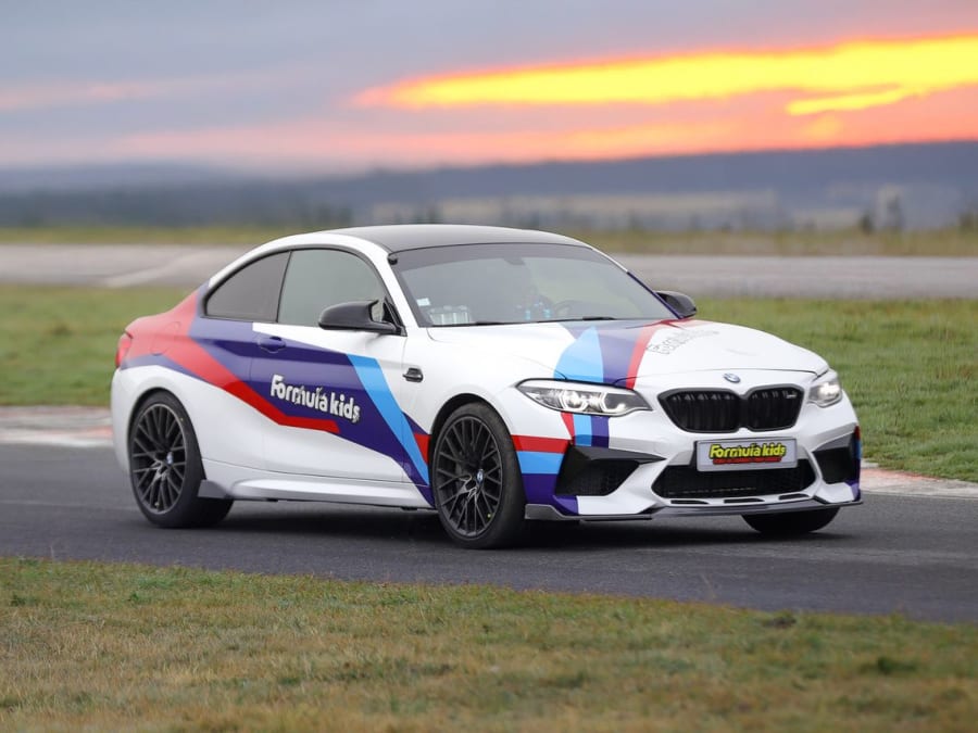 Children's driving experience in a BMW M2 at Circuit Géoparc (88