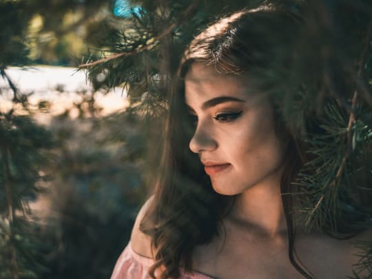 young woman considering green funeral options