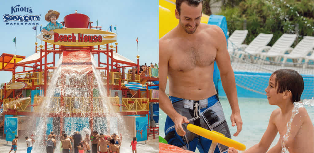 This image displays two scenes from a water park environment. On the left, there's a large, colorful water play structure with multiple levels labeled "Beach House" at Knott's Soak City Water Park. Dozens of people, mostly children, can be seen frolicking in the water as a massive bucket atop the structure tips over, pouring a substantial amount of water downwards, creating a waterfall effect that splashes around the area. On the right, a smiling man with dark hair, no shirt, wearing blue swim trunks, is captured in a candid moment handing a yellow water toy or float to a young boy with wet hair who is also smiling. Both are standing in shallow water, with white empty lounge chairs and lush greenery in the background. It's a bright sunny day, and everyone seems to be enjoying the water and activities. For those looking for a day full of fun and excitement, consider booking your adventure with us and enjoy the savings that come with our lowest prices on tickets.