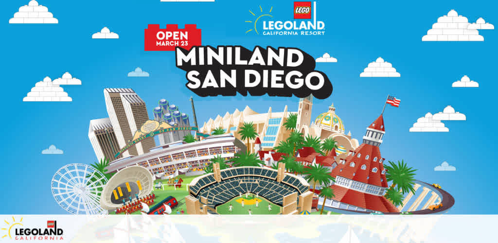 Graphic promoting Legoland California Resort's Miniland San Diego. The display opens March 23, showcasing miniaturized iconic San Diego landmarks constructed from Lego bricks. Notable are the downtown skyline, Coronado Bridge, and a detailed baseball stadium. Clouds dot a blue sky above the cheerful, colorful scene.