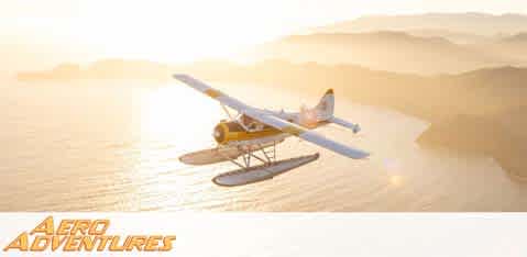 This image features a serene aerial view during what appears to be dawn or dusk, showcasing a yellow seaplane with floats flying over a calm body of water. The glowing sun softly illuminates the scene, casting a warm golden hue over the plane and the water's surface. Gently rolling hills emerge from the mist in the background, adding to the peaceful ambience of the adventure the plane is on. The bottom right corner of the image displays the text "AERO ADVENTURES" in bold, capitalized white letters, suggesting excitement and exploration in the skies.

Planning your next adventure is even more thrilling when you know you're getting the best savings. With FunEx.com, you're assured of exclusive discounts and the lowest prices on tickets to create memories without breaking the bank.