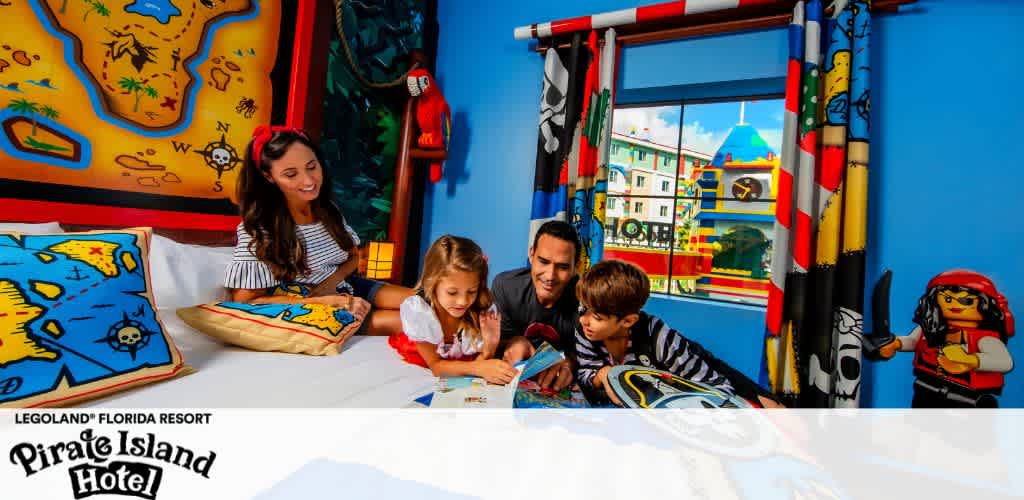 Family enjoys a pirate-themed hotel room with colorful LEGO decor.