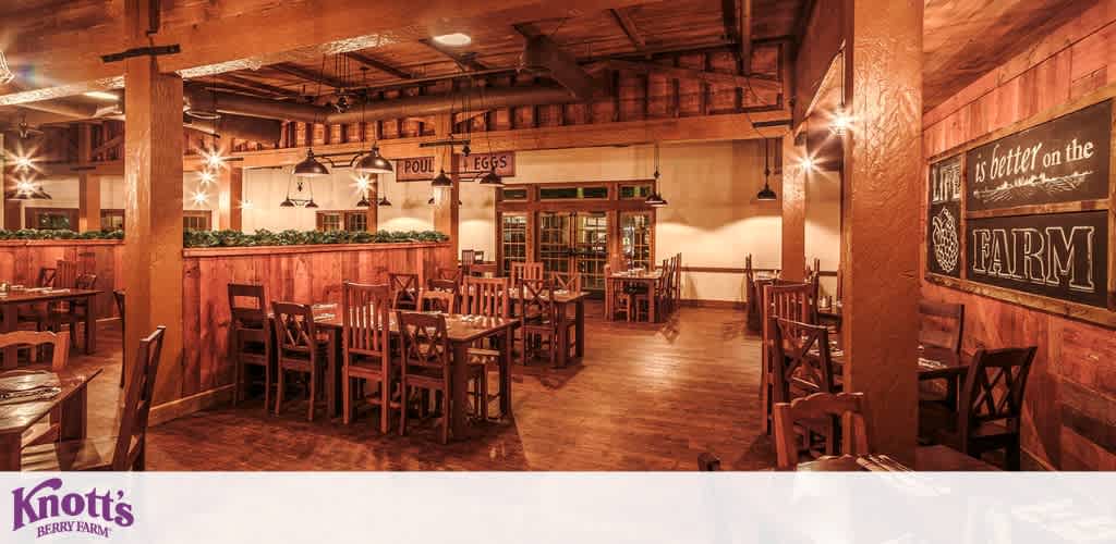 Cozy, rustic dining area with warm lighting and wooden furniture. The room features a country-style decor with a chalkboard declaring  Life is better on the FARM.  Greenery lines the top of a partial room divider, enhancing the farm-like ambiance. The floor is wood paneled, and the ceiling has exposed beams.