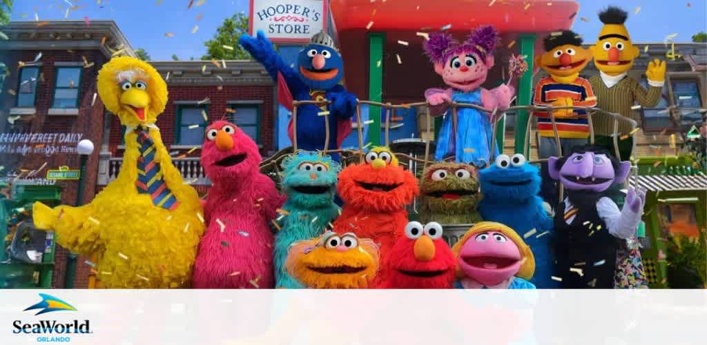 Colorful Sesame Street characters in front of Hooper's Store at SeaWorld Orlando.