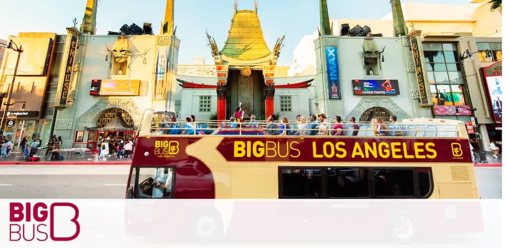 A Big Bus tour with passengers near the iconic TCL Chinese Theatre in Los Angeles.