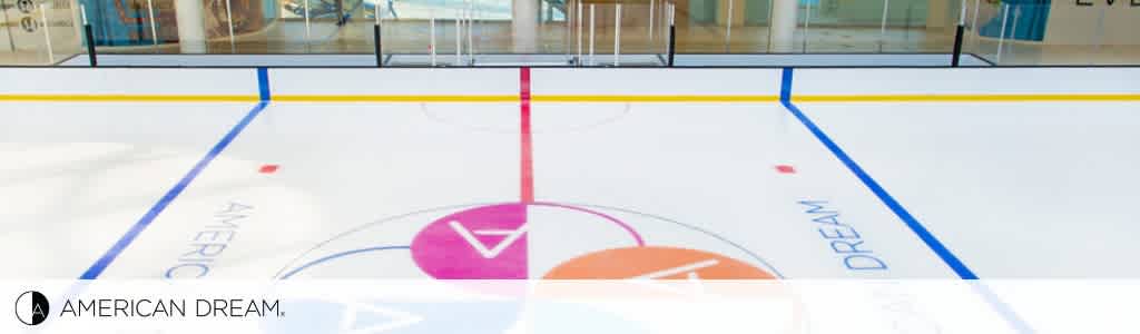 Image of two separate ice skating activities. On the left, a group of people in helmets and sports gear play ice hockey. On the right, a family of four enjoy recreational skating while holding hands; the youngest member is sitting on a blue seal-shaped glider. The background shows the interior of an ice rink with the text 'American Dream' and its logo on the lower left corner.