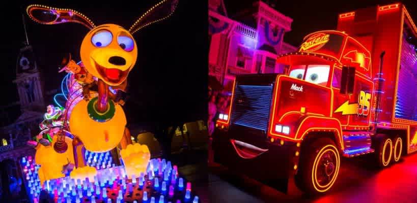 A vibrant parade float features animated characters from popular films. On the left, a glowing dog character with long ears carries two toy-sized figures. On the right, a brightly lit truck with expressive eyes showcases vivid red and orange lights. The background is illuminated with multicolored neon buildings, creating a lively nighttime atmosphere.