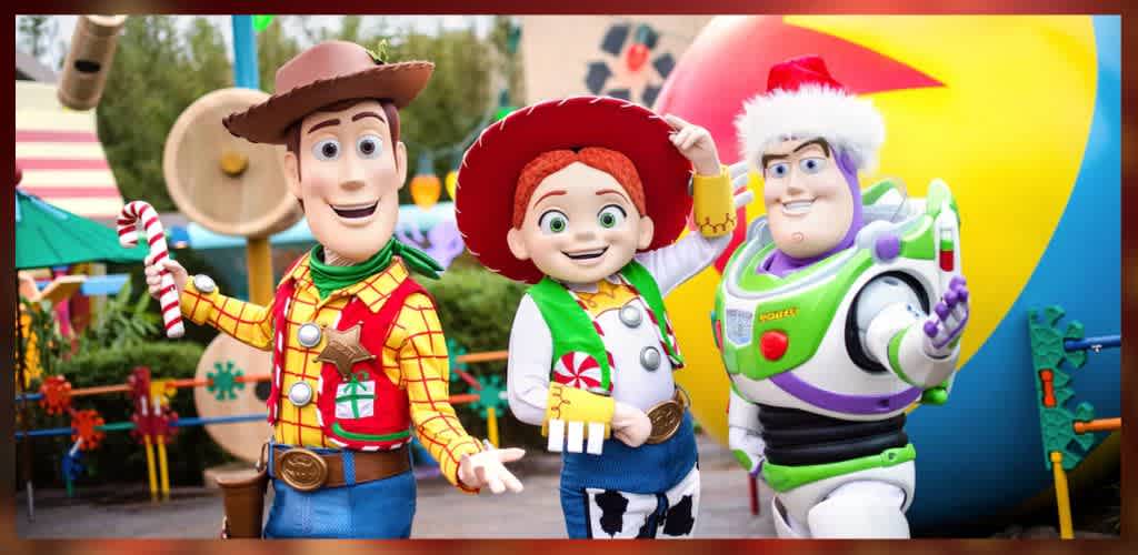 Three animated characters pose cheerfully in a theme park setting. One, dressed as a cowboy, holds a candy cane. The second character wears a cowgirl outfit with a festive hat. The third, in a space suit, sports a Santa hat. Bright decorations and a large colorful ball create a vibrant background, enhancing the joyful and festive atmosphere.