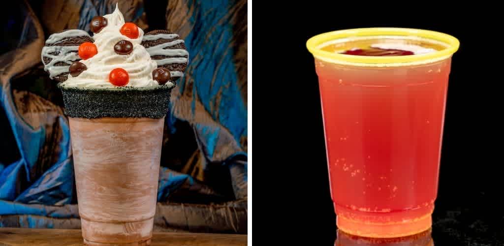 A chocolate milkshake topped with whipped cream and cherry garnishes next to a red fruit soda in a plastic cup with a yellow rim.
