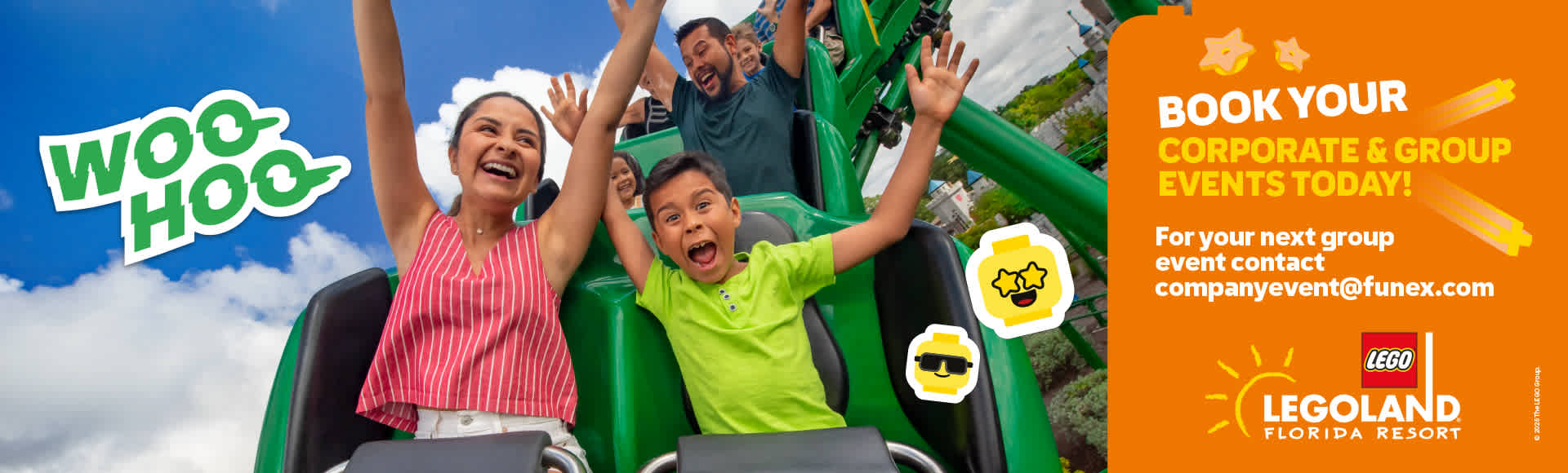 Happy children riding a roller coaster at Legoland Florida Resort during daytime with a bright sky and smiling faces.