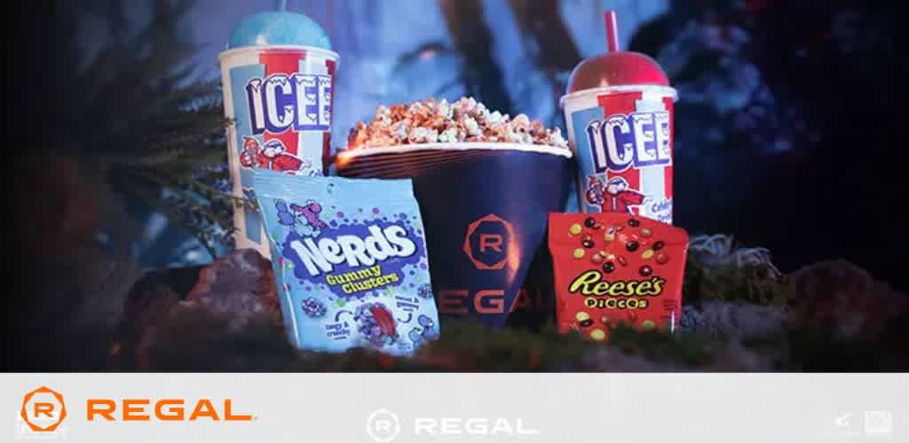 Movie snacks including a popcorn tub, ICEE drinks, Nerds, and Reese's Pieces with Regal branding.