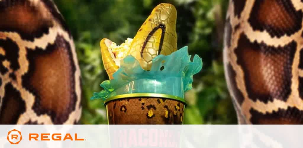 Popcorn holder with a golden snake head and teal accents against a jungle background.