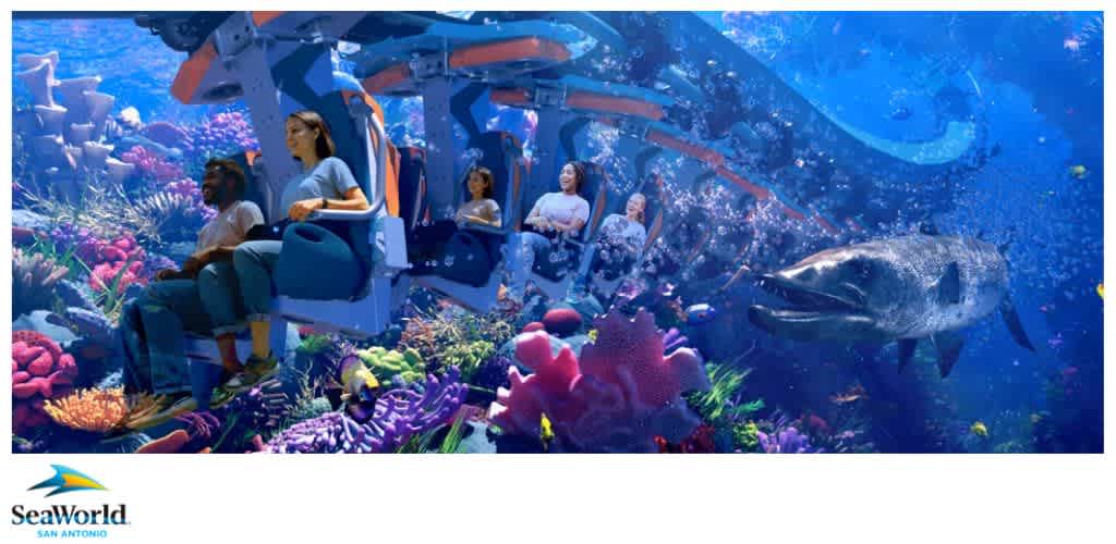 People on an underwater-themed ride surrounded by vibrant corals and marine life.