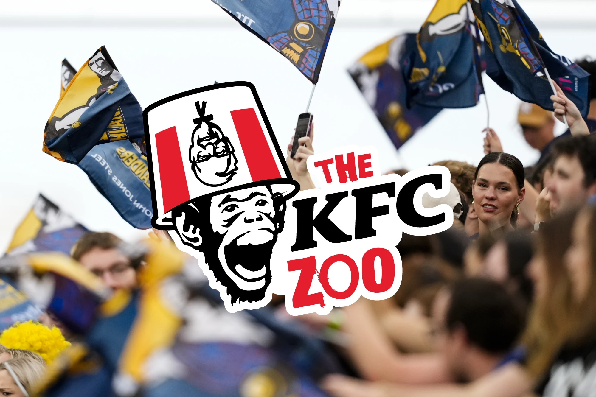 The KFC Zoo logo over a crowd of sports fans waving flags.