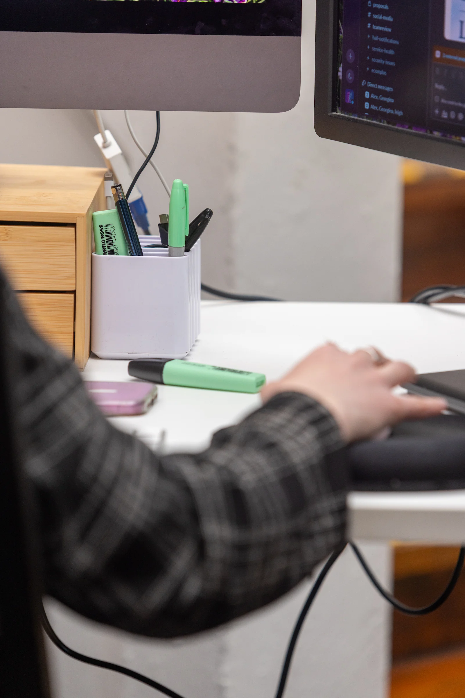 close up shot of staff working on a computer
