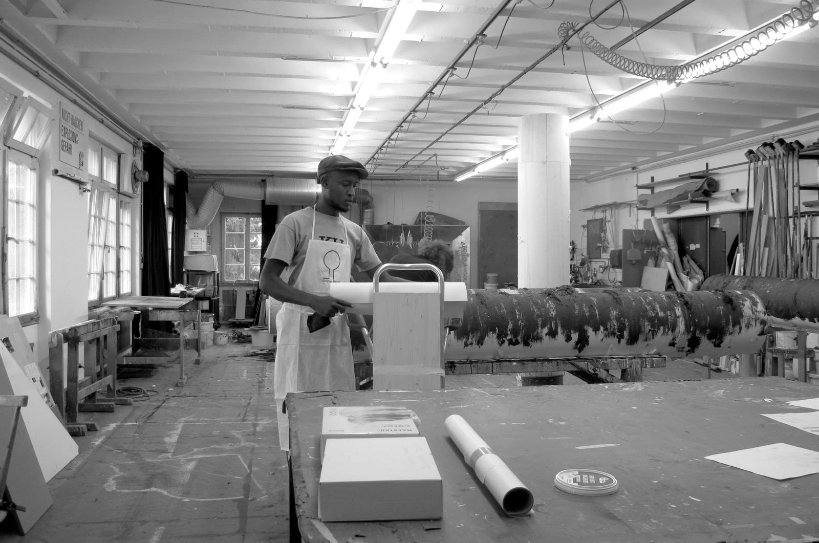 Joel Lukhovi working in a print studio