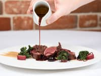 LOrtolan Review Meat Dish with Gravy Pouring