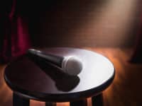 Different Times Stand Up Comedy Stool and Microphone