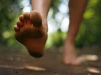 Page Turner June Crossing Bare Foot Young Man in Forest Trail