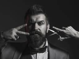 The Big Bang June Bearded Man and Scissors Posing Black and White