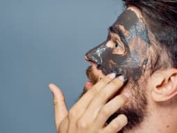 Gentlemens Skin Care Man Applying Face Mask