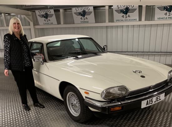 Women Behind the Wheel Beryl With White Jaguar Smiling