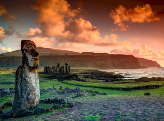 EASTER ISLAND The Riddle of the Pacific Moai against the cliff